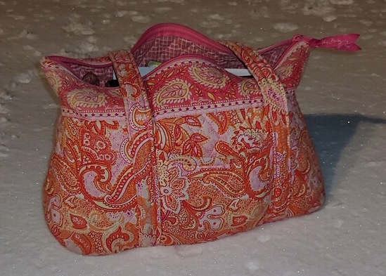 Vera bradley purse in coral and pink colors