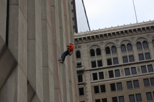 Rappelling down the side of the Key Bank Building. 