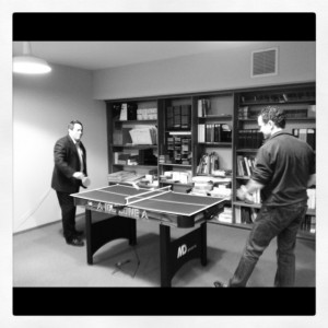 Jim Hausfeld Playing Ping Pong with the team
