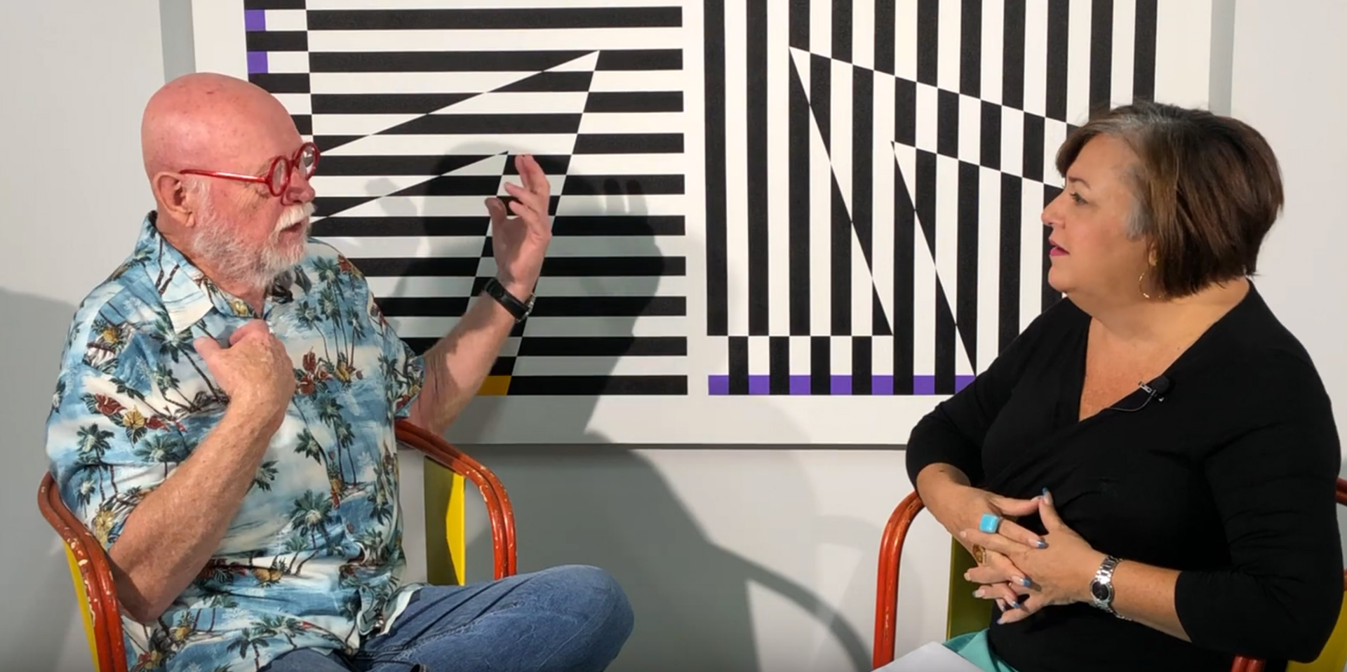 Gary Hinsche is interviewed at art exhibition